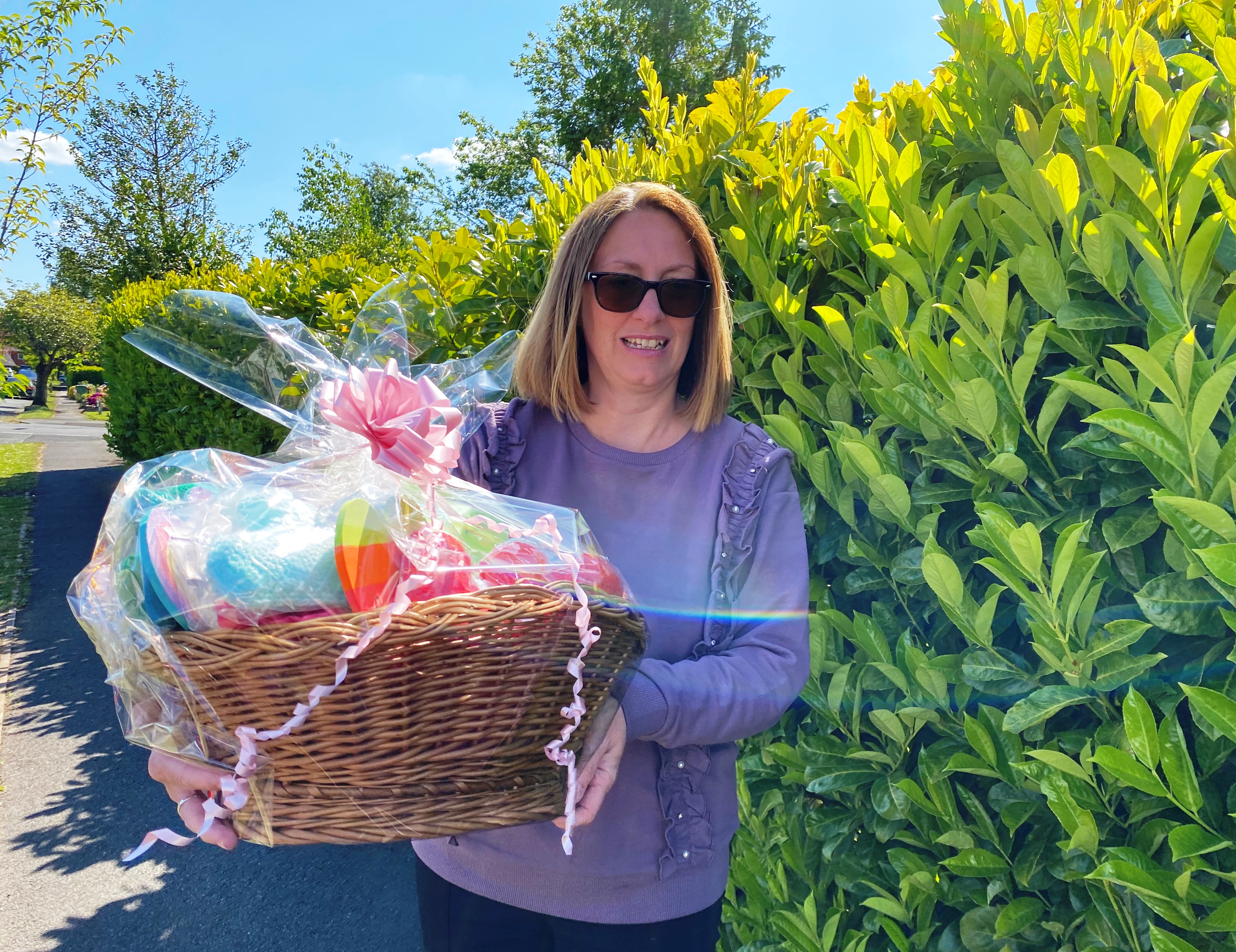  Angela Daniels, a learning support assistant at Ashcroft School, with a basket of love for the staff and patients at the ICU at Wythenshawe Hospital