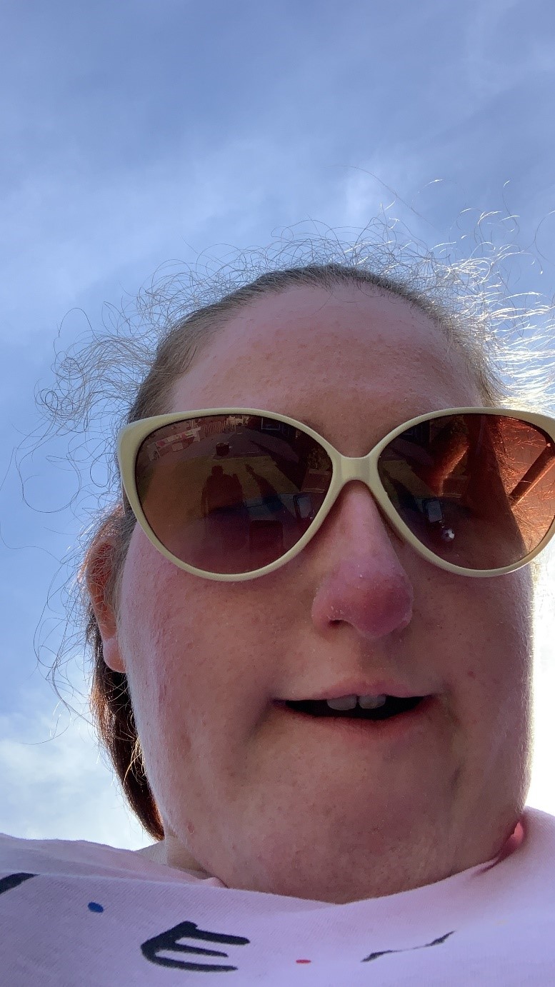 Greer: “Lovely selfie, backlit nicely by the sun.” Paul Coates A selfie of Greer wearing sunglasses with a blue sky behind her