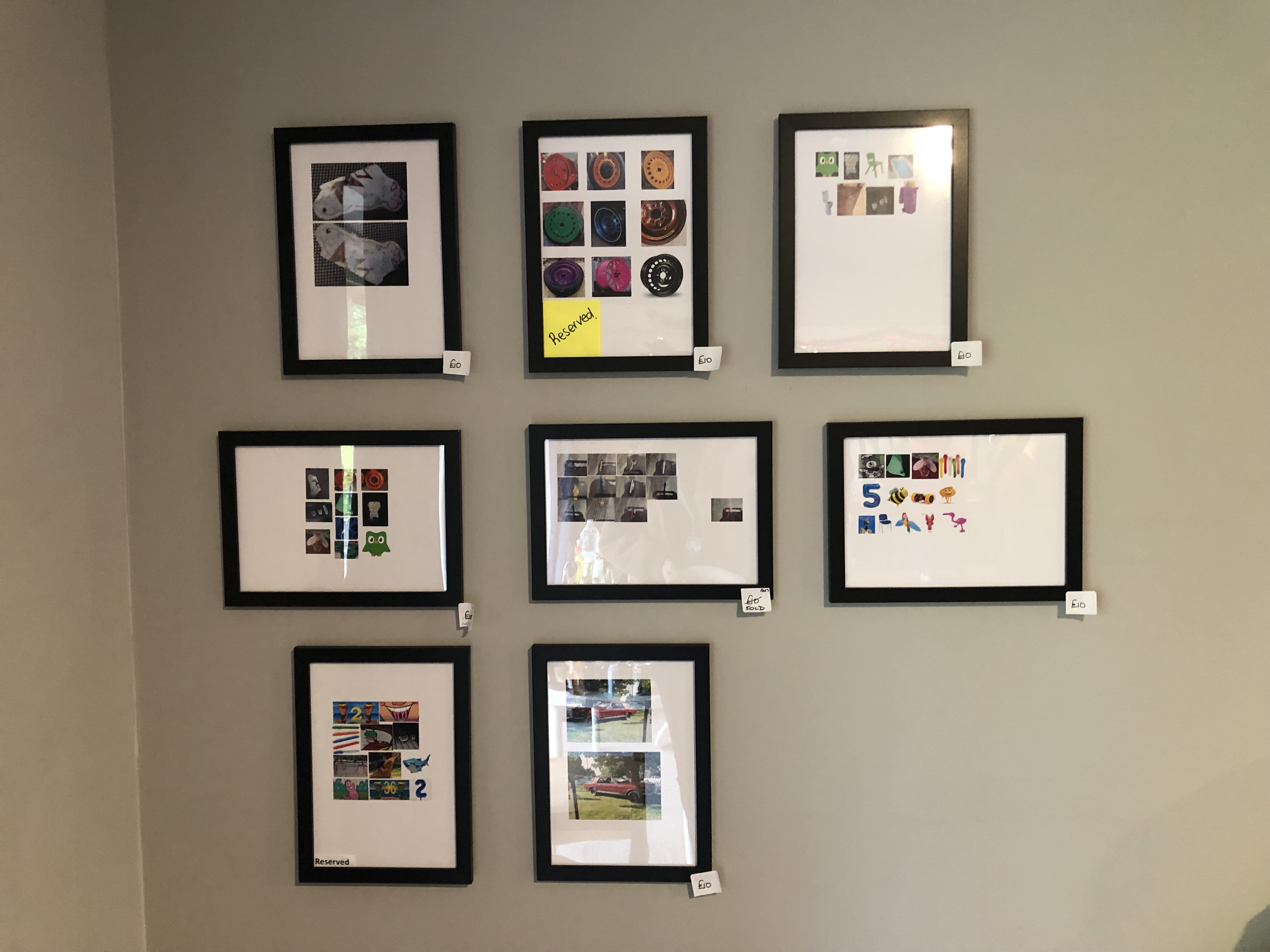 A display of the young person's collection of collages on the wall