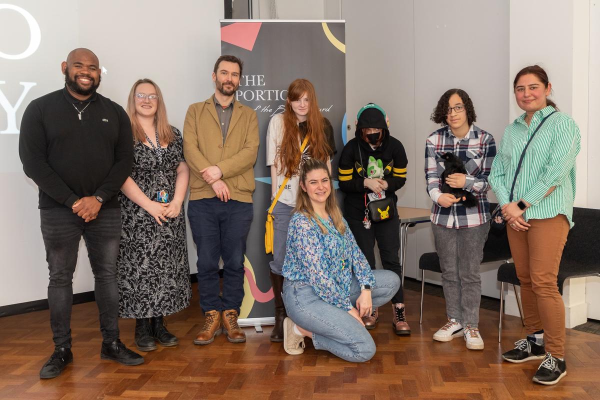 Image shows MC Reece Williams, Judge Oliver East with teachers and students Talia, Ebony and Saffron from Inscape House School