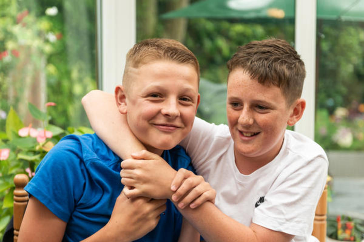 Two young boys smiling Two young boys smiling