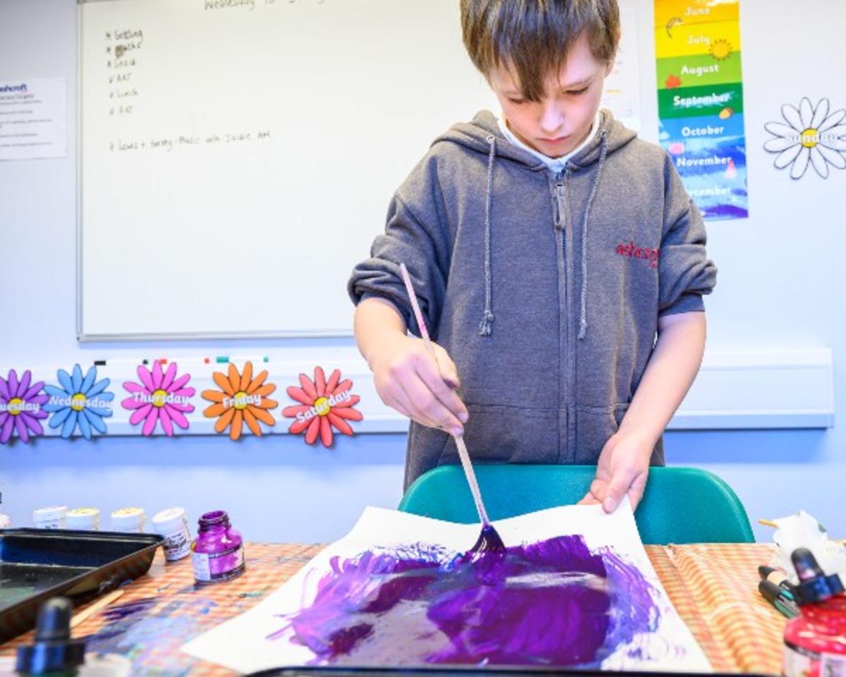 A boy painting