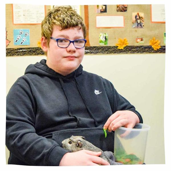 Logan with a guinea pig