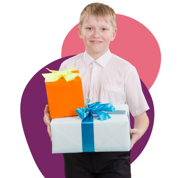 a young boy holding two Christmas presents