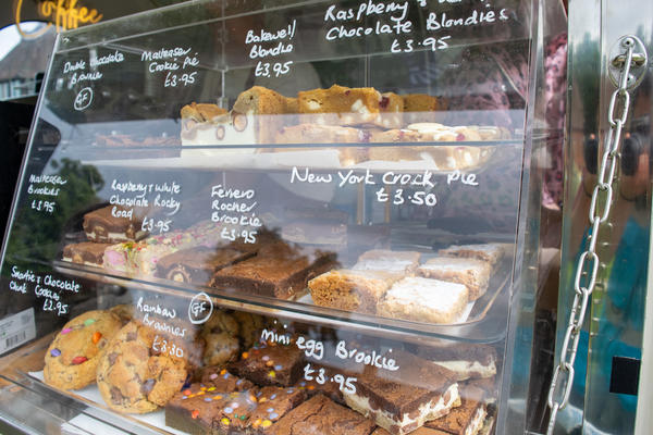 cakes in a glass cabinet 