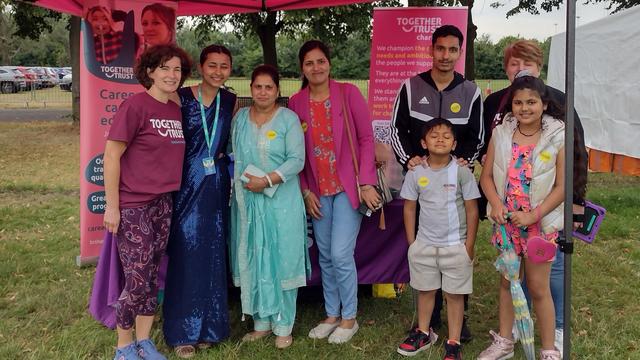 Together Trust team and visitors at the festival.