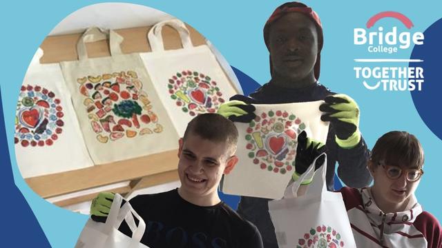 Students displaying their designed tote bags
