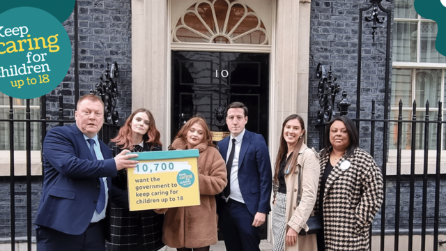 KeepCaringto18's delegation outside 10 Downing Street holding petition box